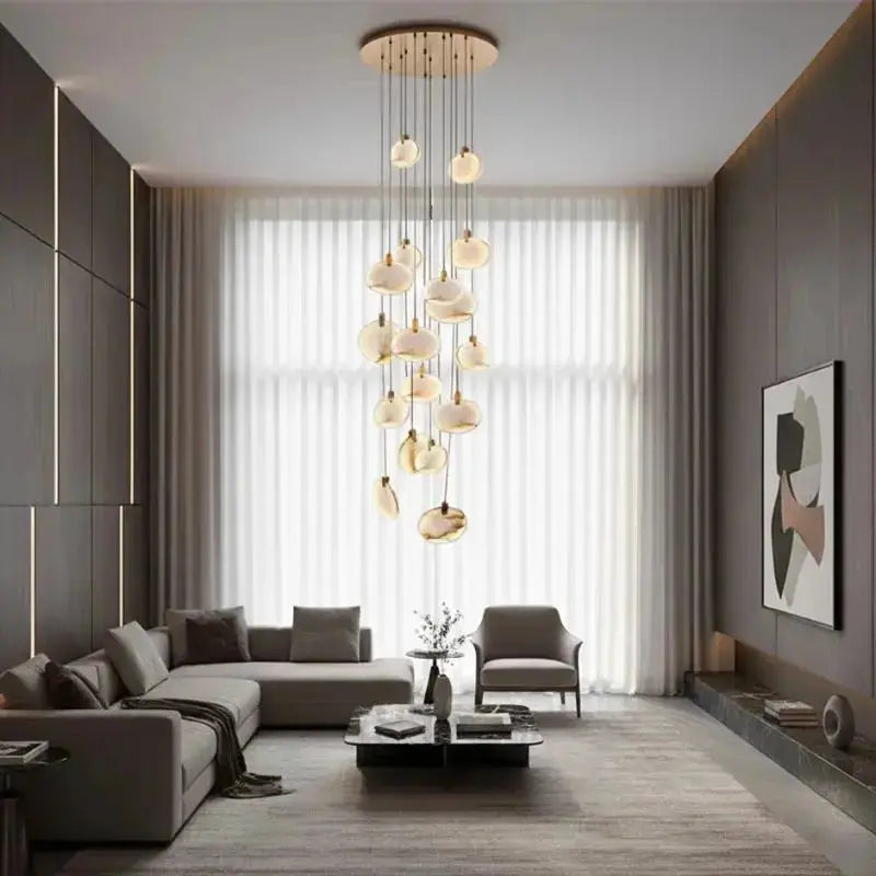 Modern Discs Long Staircase Alabaster Chandelier — shown in an interior setting