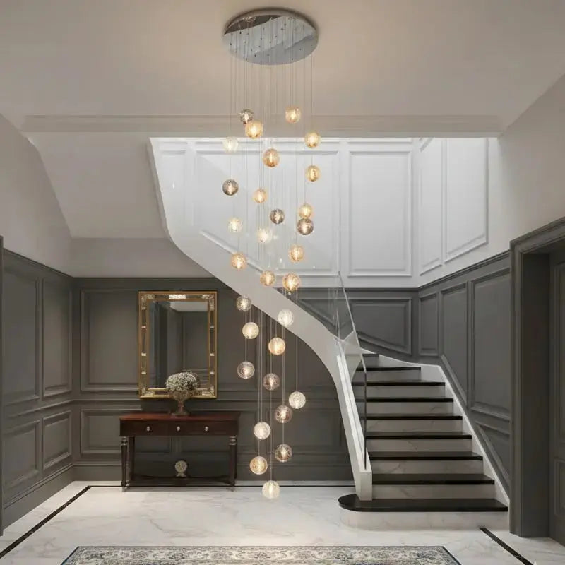 Modern Planets Staircase Chandelier — shown in an interior setting