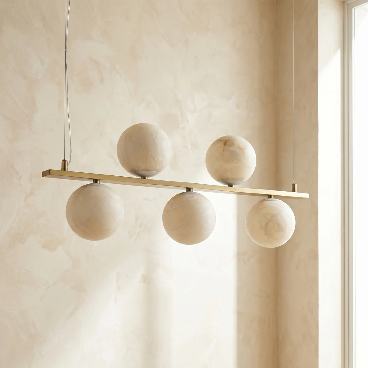 Brass Linear Alabaster Pendant Light — illuminated view